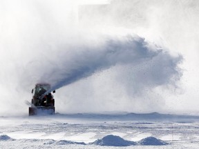 Crews were busy working on the Rideau Canal Skateway Monday, but the NCC says the ice is not yet safe for skating.