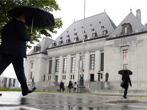 The Supreme Court of Canada building is pictured in Ottawa on Wednesday October 15, 2014. THE CANADIAN PRESS/Sean Kilpatrick