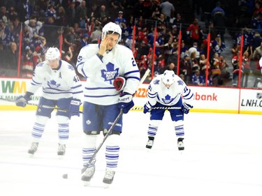 The Toronto Maple Leafs show their dejection after losing to the Ottawa Senators.