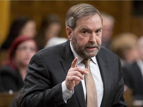 NDP leader Tom Mulcair rises during Question Period in the House of Commons Monday January 26, 2015 in Ottawa.