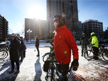 Tony Lovink peppers to depart City Hall as they take part in the 4th Annual Family Winter Cycling Parade, celebrating winter cycling on Sunday, January 25, 2015.  (Cole Burston/Ottawa Citizen)