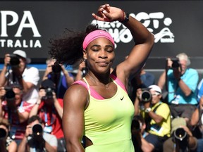 TOPSHOTS Serena Williams of the US celebrates after victory in women's singles semi-final match against Madison Keys of the US on day eleven of the 2015 Australian Open tennis tournament in Melbourne on January 29, 2015.