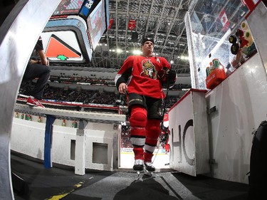 Chris Neil #25 of the Ottawa Senators leaves the ice after warmup.