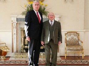 Former House of Commons sergeant-at-arms Kevin Vickers (left) meets with Ireland President Michael Higgins after being introduced as Canada's ambassador to Ireland in Dublin.