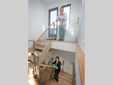 Not only is the glass, maple and stainless-steel stairwell one of the home’s visual highlights, but by creating a chimney effect it’s a key part of the heating and cooling system for owners Chantal Rioux and Nicolas Delahousse. The top of the stairs leads to a wraparound balcony. “Every day in the summer we head up here for the nice, cool breeze,” says Delahousse. “We have a drink and ask, ‘How was your day?’ ” The stairwell required a slight bump-out on the side of the house.