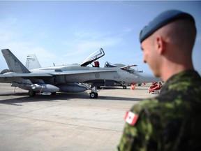 A CF-18 sits on the tarmac in Italy in 2011.