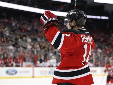 New Jersey Devils center Adam Henrique celebrates after scoring a goal against the Ottawa Senators during the second period.