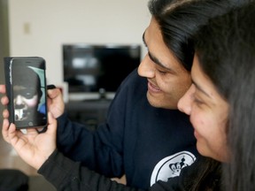 Aman Sood and Bhavna Bajaj link by Skype with their young son, Daksh Sood, who is living with his grandparents in India.