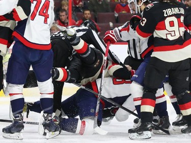 Bobby Ryan of the Ottawa Senators is upended by Alex Ovechkin of the Washington Capitals after Ryan didn't like the hit that Ovechkin made on Erik Karlsson during second period NHL action.