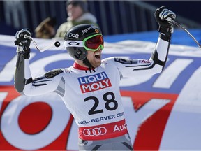 Dustin Cook celebrates his run at the finish line of the men's super-G competition at the alpine skiing world championships, Thursday.