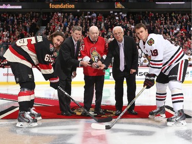Senators assistant coach Mark Reeds, second from left, has died of illness.
