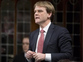 Citizenship and Immigration Minister Chris Alexander responds to a question during question period in the House of Commons on Parliament Hill in Ottawa on Thursday, January 29, 2015.