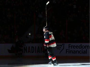 Chris Phillips salutes the crowd during his 1179 start as an Ottawa Senators prior to the game.