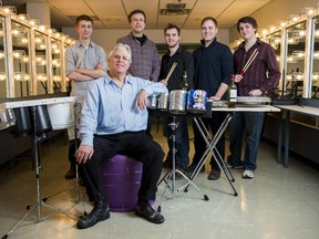 Composer, Jan Jarvlepp (Front, sitting) and (L-R) Percussionists, Zac Pulak, Ken Simpson, Dominique Moreau, Andrew Harris, and Alec Joly Pavelich were to perform the  Garbage Concerto with their unusual instruments including hub caps, glass bottles, tin cans and plastic bins.