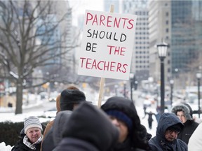 Demonstrators gather in front of Queen's Park to protest against Ontario's new sex education curriculum in Toronto on Tuesday, February 24, 2015.