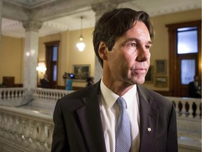 Health Minister Eric Hoskins is pictured at Queens Park in Toronto on June 24, 2014.