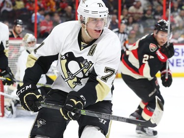 Eugene Malkin of the Pittsburgh Penguins against the Ottawa Senators during first period of NHL action at Canadian Tire Centre in Ottawa, February 12, 2015.