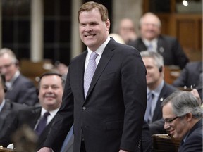 Foreign Minister John Baird speaks in the House of Commons in Ottawa on Tuesday, Feb. 5, 2015. Baird announced his resignation.