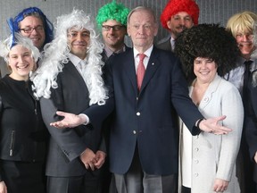 Former PM Jean Chrétien reacts to other wig-wearing lawyers from Dentons Canada LLP on Thursday. They include from left, legal student Karine Azoulay, lawyers David Elliott, Aniss Amdiss, legal student Marlow Wilson, Chrétien, lawyers James Wishart, Catherine Coulter and Scott McLean.
