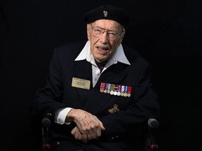 Canadian WWII veteran Ernest Cote poses on June 5, 2014 in Courseulles-sur-mer, Normandy.