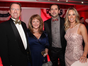 From left, Bell Canada V-P Gary Cameron with his wife, Cindy, and Ottawa Senators defenceman Chris Phillips and his wife, Erin, at the Ferguslea Senators Soirée held at the Hilton Lac Leamy on Wednesday, February 4, 2015.