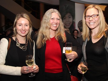 From left, Brittany Trumper from IAMGold Corporation, Cheryl Robb from Syncrude, and Alexa Young from Teck Resources Ltd. at a Macdonald-Laurier Institute event held Wednesday, February 18, 2015, at the Canadian Museum of History.