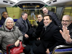 From left: city councillors Shad Qadri, Marianne Wilkinson, Jean Cloutier, George Darouze, Stephen Blais, Michael Qaqish, and Jeff Leiper head into the bus wash from the upper level of the double decker.  Ottawa city councillor and Chair of the Transit Commission, Stephen Blais,  invited other city councillors and the media to a Transit Services Information session Monday that included touring OC Transpo facilities and garages, going through a bus wash and even driving one of the double deckers. (Julie Oliver / Ottawa Citizen)