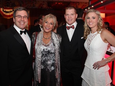 From left, Eric Coates, artistic director of the Great Canadian Theatre Company, with Barbara Crook, Ottawa Senators winger Chris Neil and his wife, Caitlin, at the Ferguslea Senators Soirée held at the Hilton Lac Leamy on Wednesday, February 4, 2015.