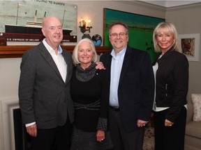 From left, hosts Glenn McInnes and his wife, Barbara, with Citizen Advocacy executive director Brian Tardif and fund development director Gail Carroll at Appetites for Advocacy, held Thursday, February 19, 2015, at the McInnes home (artworks are by local artists Eric Walker and Duncan de Kergommeaux).