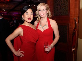 From left, Lois Lee and MC Patricia Boal, both from CTV Ottawa, were among the lovely ladies in red at The Snowflake Ball held at the Hilton Lac Leamy on Saturday, February 14, 2015.