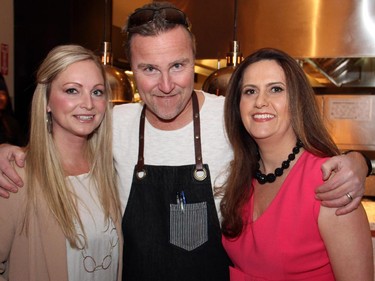 From left, Proud to be Me founder Cindy Cutts with Chef Michael Blackie, owner of NeXT, and volunteer Jennifer Clark at the Proud to be Bully Free benefit dinner held Monday, February 23, 2015.