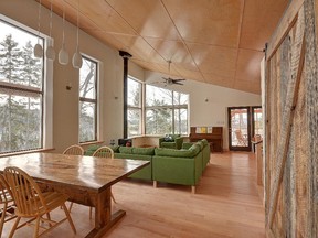 The passive solar home warms quickly thanks to an expanse of south-facing windows in the open-concept kitchen/dining/living room. The home was designed by Anthony Mach of Ottawa’s Mach Design and built by Wakefield-based Bala Structures.
