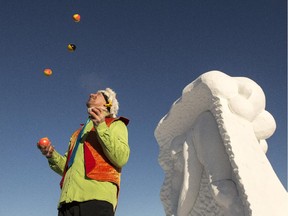 Gabzy the busker entertains spectators during the opening day of Winterlude at Jacques-Cartier Park in Gatineau Saturday January 31, 2015.