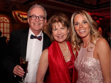 Graham Macmillan, chair of the Ottawa Senators Foundation board, with his wife, Katie, and Erin Phillips during the Ferguslea Senators Soiréeheld at the Hilton Lac Leamy on Wednesday, February 4, 2015.