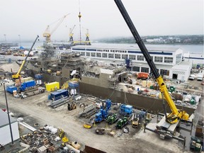 A Navy ship undergoes a mid-life refit at the Irving Shipbuilding facility in Halifax on July 3, 2014. The president of Irving Shipbuilding says the design phase of the Arctic offshore patrol ships is under budget and on time in Halifax.