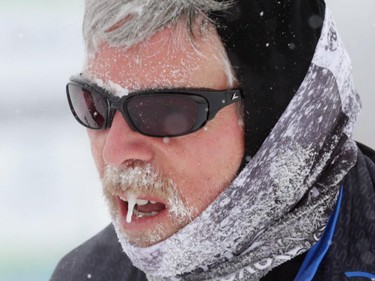 Icicles form on the face of Greg Dale Irwin (4205) during the Gatineau Loppet in Gatineau, Saturday, February 14, 2015. Competitors braved falling snow plus bone-chilling temperatures to participate in today's event, which started at 9am.
