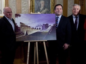 From right: Tribute to Liberty chair, Ludwik Klimkowski, with Employment and Social Development Minister Jason Kenney and artist Janusz Kapusta next to a drawing of the National Memorial to Victims of Communism in December, 2014.