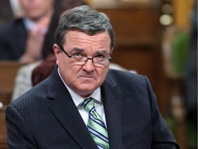 Finance Minister Jim Flaherty tables the federal budget in Ottawa on Feb. 11, 2014.