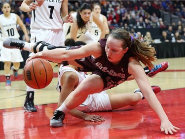 Kellie Ring of the University of Ottawa wins the battle for the ball during second half action.
