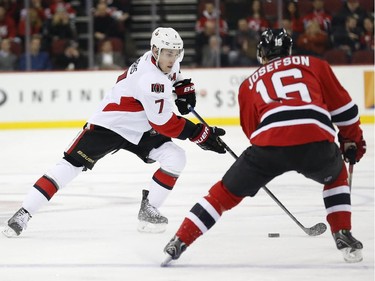 Ottawa Senators center Kyle Turris (7) skates against New Jersey Devils center Jacob Josefson (16), of Sweden, during the first period.