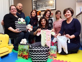 Bonnie Bouliane, from left, Eric Bouliane, Amélie Bisson, Rakhi Radia, Julia Shea, Pamela Root and Sheena Leonard are members of the Parents of Preemies Association, which helps parents of premature infants.