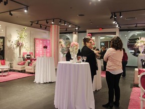 Ladies mingle at the Pink Lounge at St. Laurent shopping centre where makeup sessions, massages and gift bags are available for those who pass by.