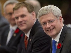 Prime Minister Stephen Harper and then-Foreign Affairs Minister John Baird in Beijing, China in November, 2014.