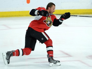 Ottawa Senators' Marc Methot warms up prior to taking on the Carolina Hurricanes in NHL hockey action.