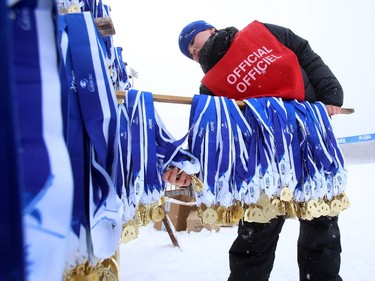 Medals are prepared during the Gatineau Loppet in Gatineau, Saturday, February 14, 2015. Competitors braved falling snow plus bone-chilling temperatures to participate in today's event, which started at 9am.