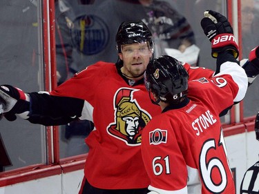 Ottawa Senators' Milan Michalek, left, celebrates a first period goal with teammate Mark Stone during first period NHL hockey action against the Edmonton Oilers in Ottawa on Saturday, Feb. 14, 2015.