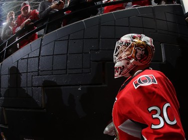 Andrew Hammond #30 of the Ottawa Senators walks down the players' tunnel for warmup prior to his first career NHL start.