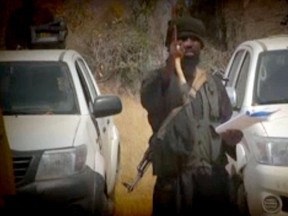 In this screen grab image taken on Feb. 9, 2015 from a video made available by Islamist group Boko Haram, leader Abubakar Shekau makes a statement at an undisclosed location.  Shekau vowed in a new video released on Jan. 9, 2015 that the group would defeat a regional force fighting the militants in Nigeria's far northeast, Niger and Cameroon.