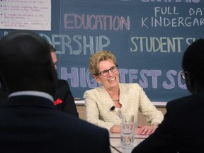 Ontario Liberal Leader Kathleen Wynne speaks with student leaders in London, Ont., on Monday, June 9, 2014.