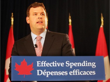 2006: Treasury Board Minister Hon. John Baird reported that the $13B government surplus will go towards reducing the national debt, and that Canadian taxpayers can expect $1B in additional savings with "effective spending" and streamlining across all federal departments, September 25, 2006.